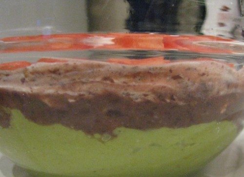 layered bean dip with guacamole