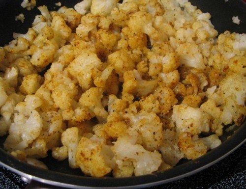 curry and paprika on sauted cauliflower