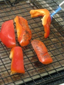 blow torching red peppers