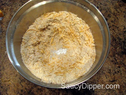 Mix grated cheese dry ingredients